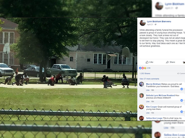 Teens playing basketball stop game to kneel for funeral procession