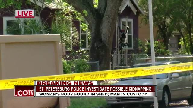 Man displayed dead woman's body in backyard shed, cops say