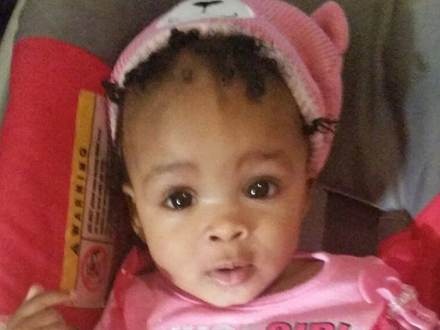 Report: Baby stabbed, burned in oven was still alive when grandmother allegedly put her in