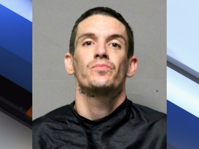 Woman kills escaped inmate who kicks in her door, sheriff says